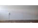 Empty wall with an outlet and baseboard at 6100 12Th S St # 211, St Petersburg, FL 33705