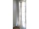 Room showcasing a window with sheer curtains, creating a light and airy atmosphere at 6100 12Th S St # 211, St Petersburg, FL 33705