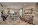Home office with built-in shelving, a desk, and comfortable seating at 7809 Alafia Dr, Riverview, FL 33578