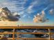 Beautiful harbor view featuring a multitude of boats docked beneath a picturesque blue sky with clouds at 2539 Gary Cir # 603, Dunedin, FL 34698