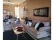 Inviting living room with plush seating, stylish decor, and a view into the dining area at 6816 Dali Ave # 101, Land O Lakes, FL 34637