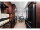 Modern kitchen with stainless steel appliances and breakfast nook at 2539 Gary Cir # 603, Dunedin, FL 34698