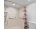 Walk-in shower with grab bars for accessibility at 2539 Gary Cir # 603, Dunedin, FL 34698