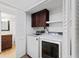 Laundry room with washer, dryer, and cabinets at 2539 Gary Cir # 603, Dunedin, FL 34698