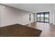 Bright living room with water views and wood floors at 2539 Gary Cir # 603, Dunedin, FL 34698