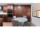 Living area with wood floors and access to balcony at 2539 Gary Cir # 603, Dunedin, FL 34698
