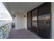 Spacious balcony with water views and sliding glass doors at 2539 Gary Cir # 603, Dunedin, FL 34698