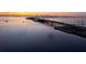Aerial view of bridge over calm water at sunset at 2539 Gary Cir # 603, Dunedin, FL 34698
