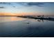 Aerial view of calm water with a kayaker at sunset at 2539 Gary Cir # 603, Dunedin, FL 34698
