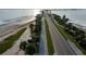 Aerial view of a road along the coast with palm trees at 2539 Gary Cir # 603, Dunedin, FL 34698