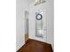 Elegant entryway with hardwood floors and stained glass door at 1008 Blue Heron Way, Tarpon Springs, FL 34689