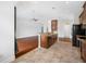Open concept kitchen with breakfast bar and hardwood floors at 1008 Blue Heron Way, Tarpon Springs, FL 34689