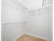 Walk-in closet with wire shelving providing ample storage at 1008 Blue Heron Way, Tarpon Springs, FL 34689