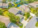Aerial view of the house highlighting its waterfront location at 1008 Blue Heron Way, Tarpon Springs, FL 34689