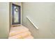 Inviting front entrance with a decorative wreath and tiled steps at 1008 Blue Heron Way, Tarpon Springs, FL 34689