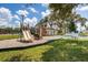 Community playground with slide and climbing structures at 13106 Pebble Beach Cir, Hudson, FL 34667