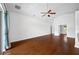 Spacious living area featuring hardwood floors and high ceilings at 1008 Blue Heron Way, Tarpon Springs, FL 34689