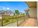 Back patio with wooden deck and canal view at 1008 Blue Heron Way, Tarpon Springs, FL 34689