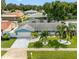 Aerial view of a single story home with a landscaped yard and pool at 2937 163Rd N Ave, Clearwater, FL 33760