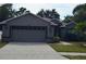 Image 1 of 75: 1412 Watermill Cir, Tarpon Springs