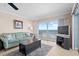 Living room with ocean view and comfortable seating at 14300 Gulf Blvd # 206, Madeira Beach, FL 33708