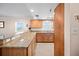 Kitchen with granite countertops and stainless steel appliances at 14300 Gulf Blvd # 206, Madeira Beach, FL 33708