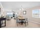 Bright dining area with ocean view and seating for four at 14300 Gulf Blvd # 206, Madeira Beach, FL 33708