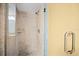 Large walk-in shower with tile surround at 14300 Gulf Blvd # 206, Madeira Beach, FL 33708