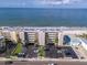 Aerial view of beachfront building and surrounding area at 14300 Gulf Blvd # 206, Madeira Beach, FL 33708