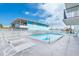 Inviting pool area with lounge chairs at 14300 Gulf Blvd # 206, Madeira Beach, FL 33708