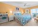 Main bedroom with king-size bed and ocean view at 14300 Gulf Blvd # 206, Madeira Beach, FL 33708