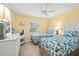 Bedroom with two twin beds and ocean view at 14300 Gulf Blvd # 206, Madeira Beach, FL 33708