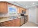 Full kitchen with stainless steel appliances at 14300 Gulf Blvd # 206, Madeira Beach, FL 33708