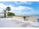 Relaxing beach deck with lounge chairs at 14300 Gulf Blvd # 206, Madeira Beach, FL 33708