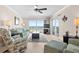 Comfortable living room with ocean view and ample seating at 14300 Gulf Blvd # 206, Madeira Beach, FL 33708