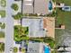 Bird's eye view of house, dock, and waterfront lot at 11220 9Th E St, Treasure Island, FL 33706