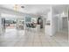 Bright kitchen with stainless steel appliances and breakfast bar, open to the living area at 11220 9Th E St, Treasure Island, FL 33706