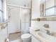 Clean bathroom with shower/tub combo, toilet and vanity at 11220 9Th E St, Treasure Island, FL 33706
