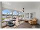 Relaxing waterfront patio with seating and water views at 11220 9Th E St, Treasure Island, FL 33706