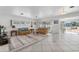 Living room with water views and access to the backyard patio at 11220 9Th E St, Treasure Island, FL 33706