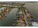 An aerial view highlighting a single-Gathering home's location in a waterfront community at 11220 9Th E St, Treasure Island, FL 33706