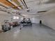 Two jet skis neatly stored in a large garage space at 3912 Fontainebleau Dr, Tampa, FL 33634