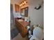 Bathroom with granite vanity, updated toilet and shower at 3912 Fontainebleau Dr, Tampa, FL 33634