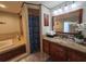 Elegant bathroom with soaking tub and double vanity at 3912 Fontainebleau Dr, Tampa, FL 33634