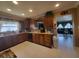 Kitchen with granite countertops and dark wood cabinets at 3912 Fontainebleau Dr, Tampa, FL 33634