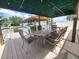 Relaxing covered patio furniture on the dock at 3912 Fontainebleau Dr, Tampa, FL 33634