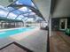 Inviting, screened pool with lounge chairs at 3912 Fontainebleau Dr, Tampa, FL 33634