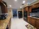 Spacious kitchen with granite countertops, ample cabinetry, and stainless steel appliances at 3912 Fontainebleau Dr, Tampa, FL 33634