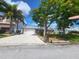 Single-Gathering home with a two-car garage and landscaped yard at 3912 Fontainebleau Dr, Tampa, FL 33634