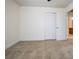 Spacious bedroom with neutral walls, carpet flooring, and double door closet at 15250 Anguilla Isle Ave, Tampa, FL 33647